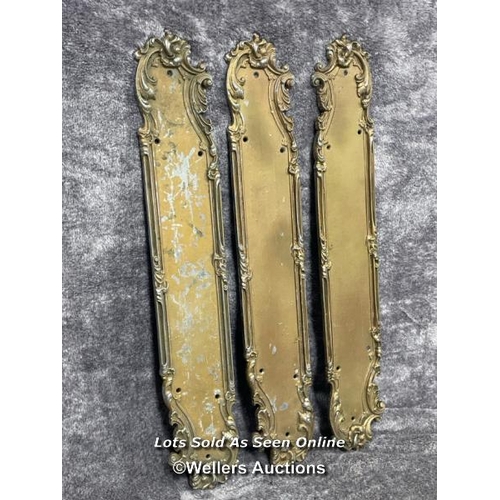 213 - Three painted metal door handle backings in art nouveau style, 52cm long x 8.5cm wide