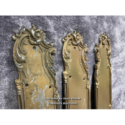 213 - Three painted metal door handle backings in art nouveau style, 52cm long x 8.5cm wide