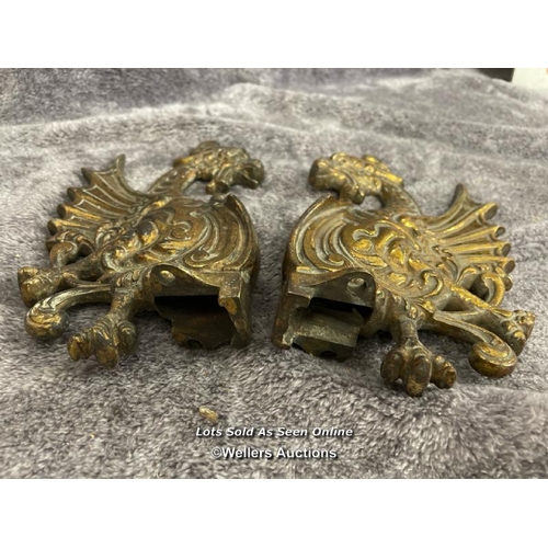 223 - A pair of brass door fixtures in form of a dragon and one other iron door knocker, dragons 20cm high... 