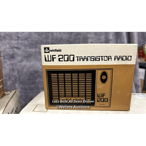 236 - Four boxed vintage Winfield transister radios and cassette recorder,  from the private collection of... 