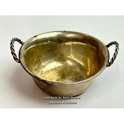 317 - Small white metal Spanish Bowl with rope style handles, faint hallmarkes, 6.5cm diameter, 16g / SF