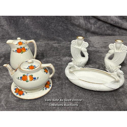 267 - Crown Ducal A1484 pattern jug and teapot with base, pair of Royal Doulton Swan candlesticks and oval... 