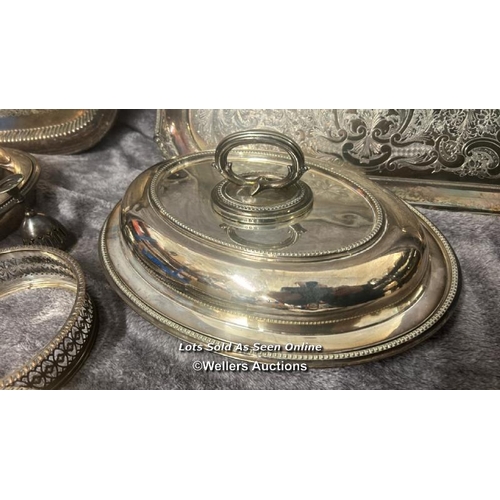 272 - Assorted metalware including two large trays and serving dishes / AN34