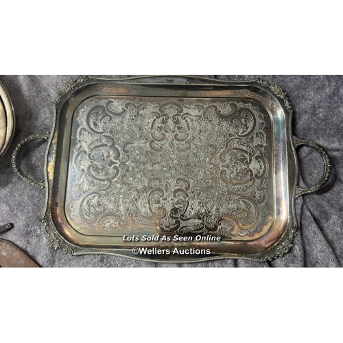 272 - Assorted metalware including two large trays and serving dishes / AN34