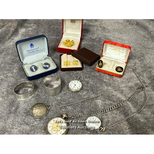 311 - Three open face pocket watches, two with watch chains, a pendant watch on chain, a silver napkin rin... 