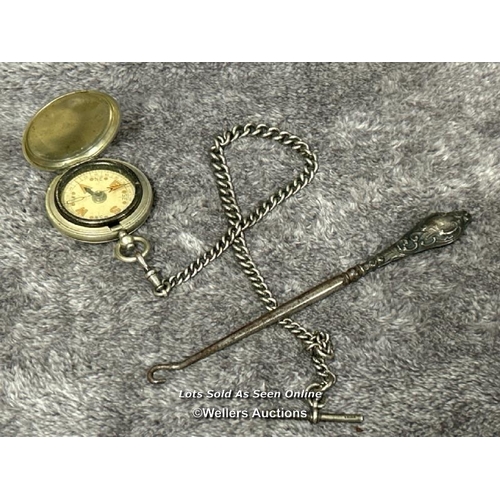 312 - A floating compass with hallmarked silver chain and silver hallmarked button hook / T42