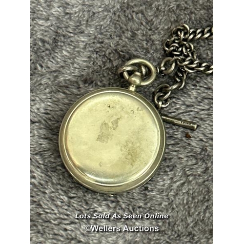 312 - A floating compass with hallmarked silver chain and silver hallmarked button hook / T42