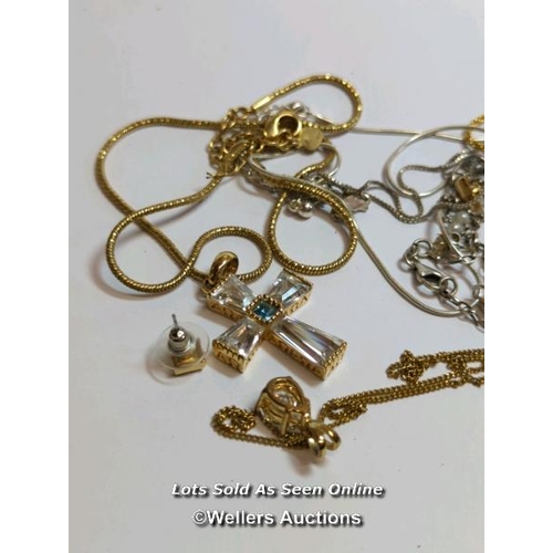 356 - A lot of fashion jewellery, including a silver cross set with cubic zarconia, a silver bracelet with... 