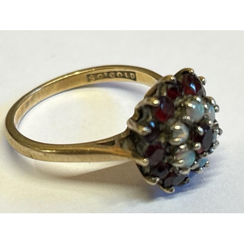 364 - Opal and garnet cluster ring stamped 9ct gold. Ring size M, gross weight 3.89g / SF