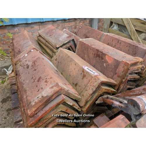 1054 - APPROX X70 RED ANGLED RIDGE ROOF TILES, LARGEST 48CM (L)