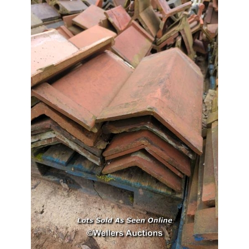 1071 - APPROX X40 ANGLED RED RIDGE ROOF TILES, LONGEST 48CM (L)