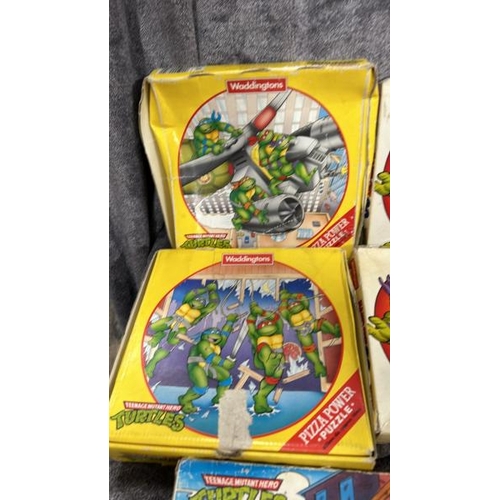 20 - A group of Teenage Mutant Hero Turtles puzzles, all unchecked / AN44