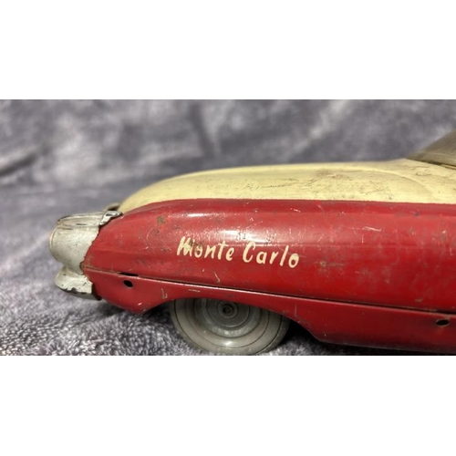 58 - A rare Mettoy Monte Carlo Tinplate Futuristic Car, in need of restoration, missing friction motor, p... 