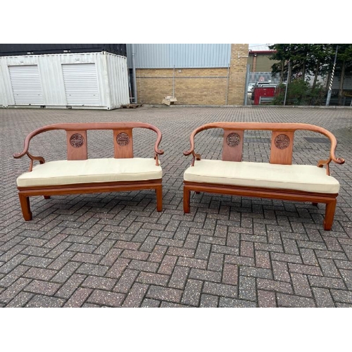 18 - PAIR OF MODERN CHINESE STYLE TWO SEATER CONSERVATORY CHAIRS WITH CUSHIONS, ONE DAMAGED, 76CM HIGH X ... 