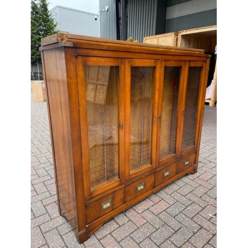 25 - ANTIQUE DISPLAY CABINET WITH TWO GLASS SHELFS AND FOLDING GLASS FRONT DOORS AND BRASS FITTINGS, FITT... 