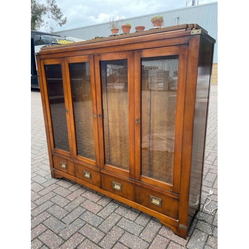 25 - ANTIQUE DISPLAY CABINET WITH TWO GLASS SHELFS AND FOLDING GLASS FRONT DOORS AND BRASS FITTINGS, FITT... 