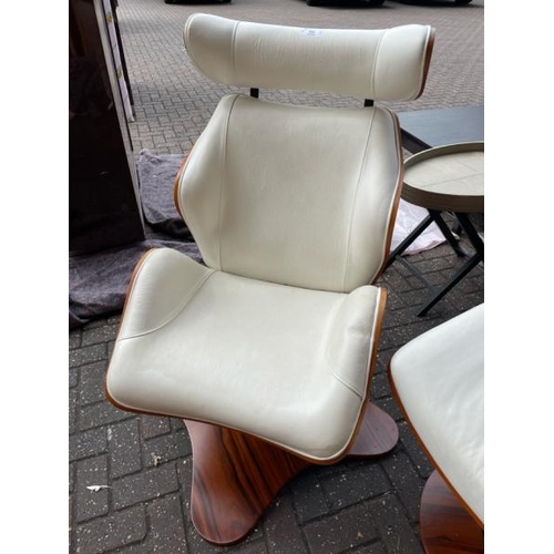 32 - CREAM FAUX LEATHER AND WOOD SWIVEL CHAIR WITH MATCHING FOOT STOOL, CHAIR 112CM HIGH X 66.5CM WIDE X ... 