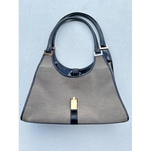 53 - A GUCCI HANDBAG, CONTAINER NO: 110343