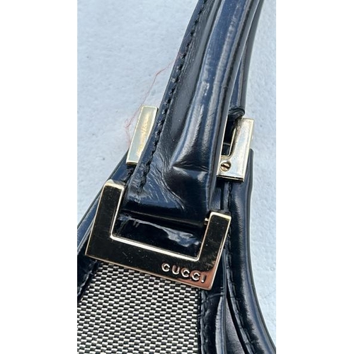 53 - A GUCCI HANDBAG, CONTAINER NO: 110343