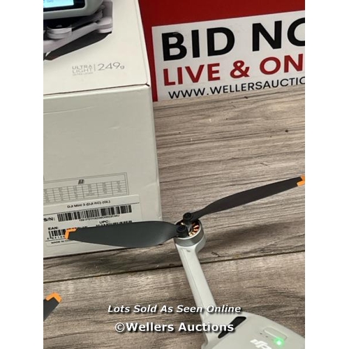 8014 - DJI MINI 3 DRONE WITH DJI REMOTE CONTROL / POWERS UP / SIGNS OF USE / BOUND TO PREVIOUS OWNER BUT ST... 