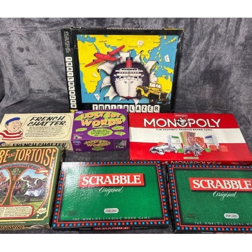 62 - Assorted board games including Monopoly, scrabble, Trailblazer and Hare & Tortoise, all unchecked fo... 