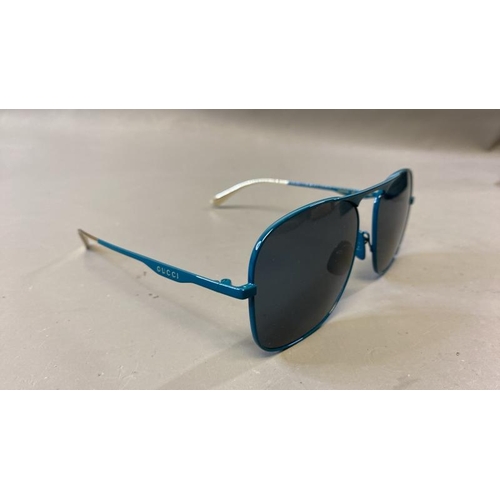 9759 - GUCCI GG0335S SUNGLASSES INCL. CASE