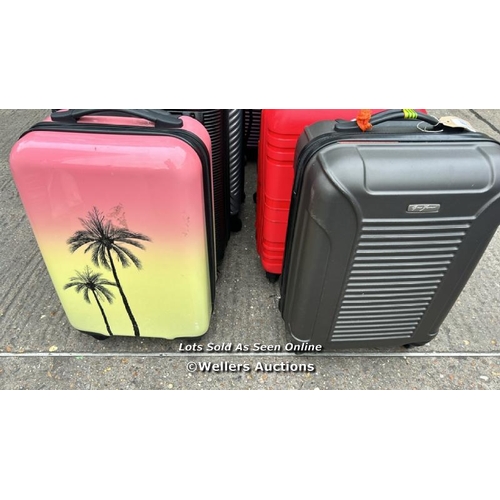 4590 - X2 PRE-OWNED SUITCASES INCL. GIRO FERRARI