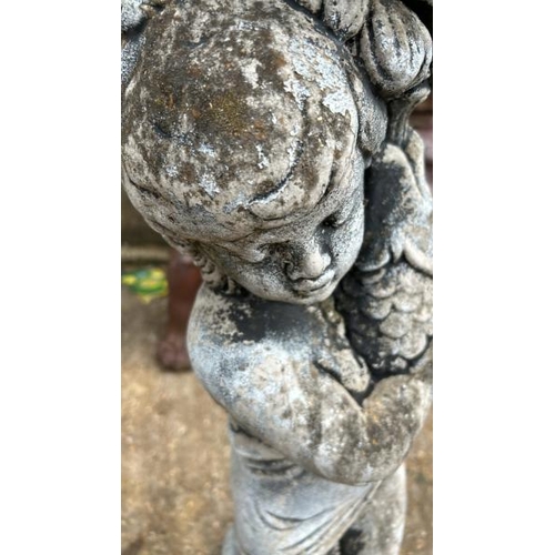 1247 - A RECONSTITUTED STONE BIRDBATH BASE DEPICTING CHERUB HOLDING A COY FISH, 85CM (H) / ALL LOTS ARE LOC... 