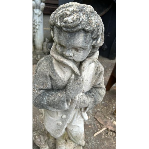 1250 - A RECONSTITUTED STONE STATUE OF A BOY IN A COAT, 74CM (H) / ALL LOTS ARE LOCATED IN SL0 9LG, REGRETF... 