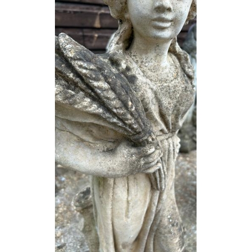 1252 - A RECONSTITUTED STONE STATUE OF A LADY HOLDING VEGETABLES, 76CM (H) / ALL LOTS ARE LOCATED IN SL0 9L... 