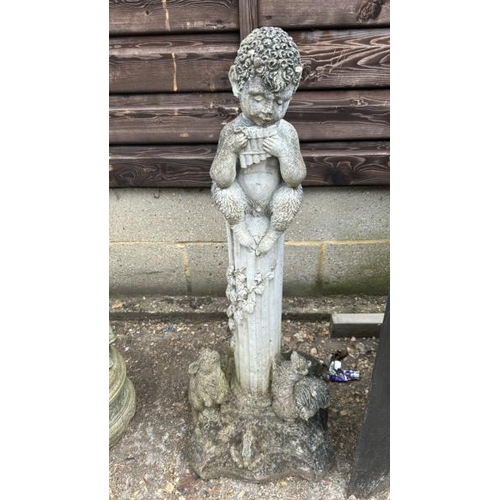 1253 - A RECONSTITUTED STONE STATUE OF A CHERUB PLAYING THE BLOWPIPES, SURROUNDED BY FAUNA, 85CM (H) / ALL ... 