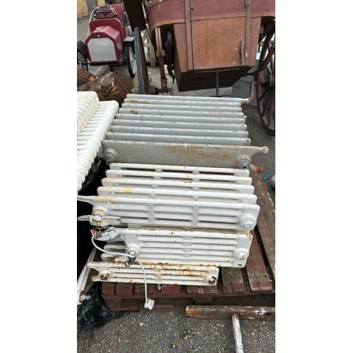 1373 - FOUR VINTAGE CAST IRON RADIATORS / ALL LOTS ARE LOCATED IN SL0 9LG, REGRETFULLY WE DO NOT OFFER SHIP... 