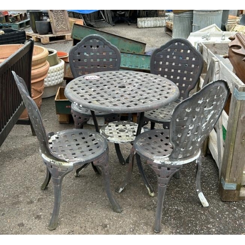 1379 - A METAL GARDEN TABLE AND FOUR CHAIRS / ALL LOTS ARE LOCATED IN SL0 9LG, REGRETFULLY WE DO NOT OFFER ... 