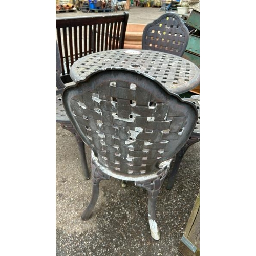1379 - A METAL GARDEN TABLE AND FOUR CHAIRS / ALL LOTS ARE LOCATED IN SL0 9LG, REGRETFULLY WE DO NOT OFFER ... 