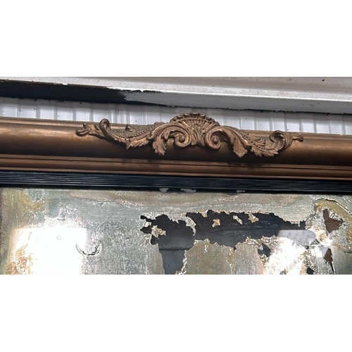 1518 - A LARGE ORNATE GILT FRAMED MIRROR, IN NEED OF RESTORATION, 140 X 66CM / ALL LOTS ARE LOCATED IN SL0 ... 