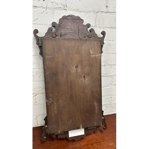 1519 - A SMALL MAHOGANY WALL HANGING MIRROR, 68 X 38CM / ALL LOTS ARE LOCATED IN SL0 9LG, REGRETFULLY WE DO... 