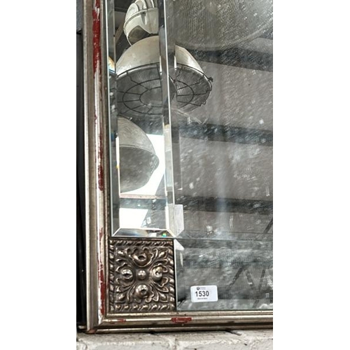 1530 - A LARGE ORNATE MIRROR WITH BEVELLED EDGE GLASS PANELS IN A METAL FRAME, 81 X 114CM / ALL LOTS ARE LO... 