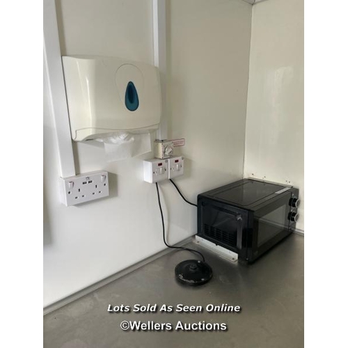 1003 - 6 PERSON 12 X 7.5FT AJC EASY CABIN TOWABLE WELFARE UNIT, INCLUDES WASH BASIN, KETTLE, MICROWAVE, SEA... 