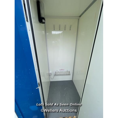 1010 - 6 PERSON 12 X 7.5FT AJC EASY CABIN TOWABLE WELFARE UNIT, INCLUDES WASH BASIN, KETTLE, MICROWAVE, SEA... 