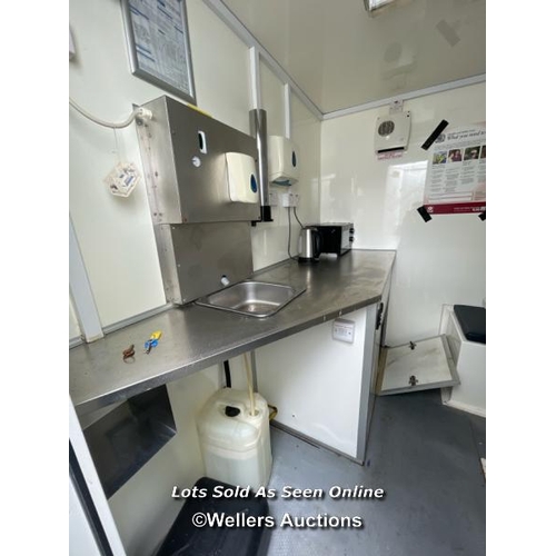 1010 - 6 PERSON 12 X 7.5FT AJC EASY CABIN TOWABLE WELFARE UNIT, INCLUDES WASH BASIN, KETTLE, MICROWAVE, SEA... 