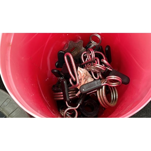 29 - A BUCKET OF WEIGHT CLIPS AND CORE WHEEL