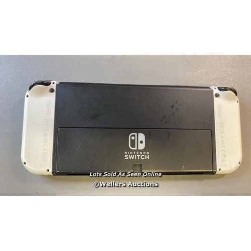 9591 - NINTENDO SWITCH OLED / HEG-001 / SN: XTJ10907495113 / RESTORED TO FACTORY DEFAULTS