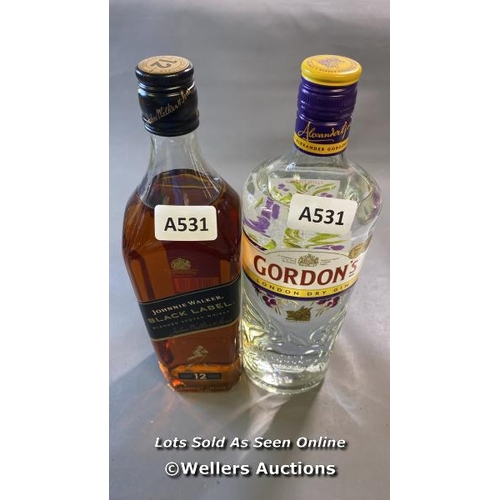 9752 - X1 NEW JOHNNIE WALKER BLACK LABEL WHISKY 40% VOL. 1L AND X1 NEW GORDONS GIN 37.5% VOL. 1L