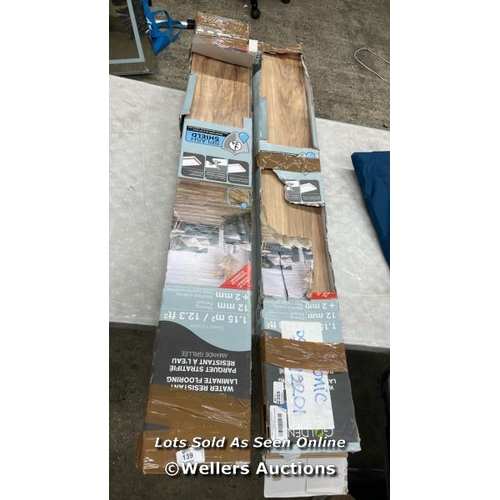 139 - LAMINATE FLOORING TOASTED ALMOND / DAMAGED PACKAGING / SEE IMAGES