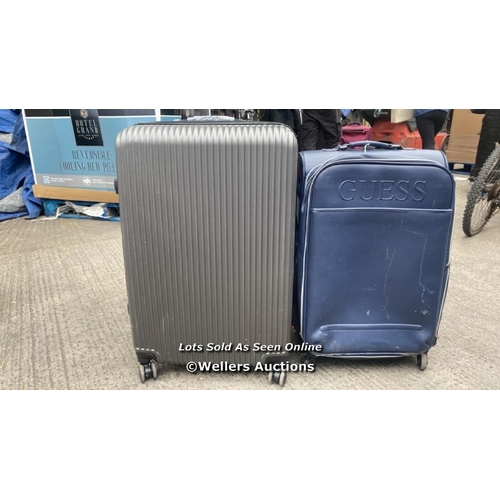 934 - X2 PRE-OWNED SUITCASE INCL. GUESS