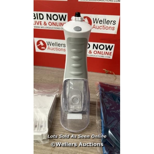 4011 - WATERPIK WATER FLOSSER / PART USED CONDITION / SOME ITEMS SEALED / MISSING ONE POWER SUPPLY / SEE IM... 