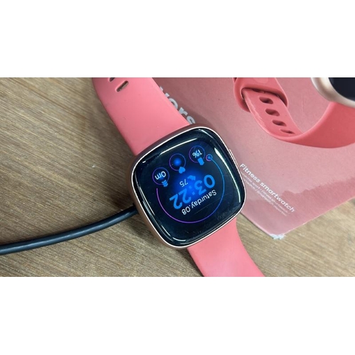 8513 - FITBIT VERSA 4 / PINK / POWERS UP, MINIMAL SIGNS OF USE, NOT FULLY TESTED