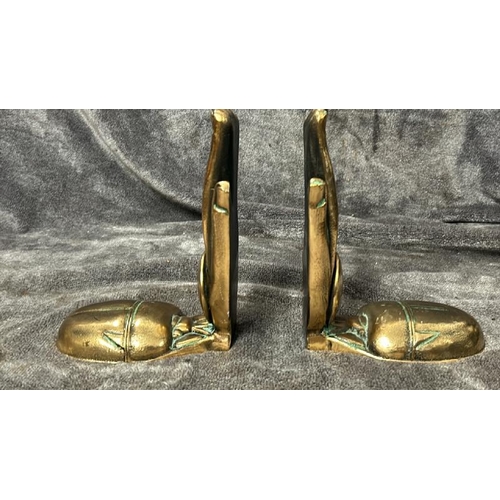 29 - PAIR OF BRASS BOOKENDS IN THE FORM OF EYGIPTIAN HANDS AND SCARABS, BASE 15CM LONG, 20CM HIGH / 76553... 