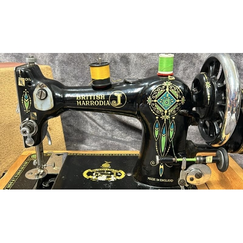 36 - A BRITISH HARRODIA SEWING MACHINE NO. 501869, WITH ACCESSORIES AND HAND WRITTEN INSTRUCTIONS / T10