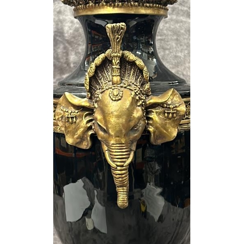 42 - A LARGE BLACK PORCELAIN AND BRASS URN WITH ELEPHANT HANDLES, BY JOHN RICHARD, IN GOOD CONDITION, 55C... 